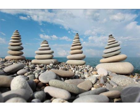 Vlies Fototapete - Steine auf Strand 375 x 250 cm 